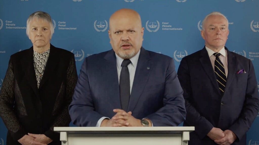 ICC Chief Prosecutor Karim Khan (centre) announces his request for arrest warrants against Israeli and Hamas leaders on May 20 (Screenshot)